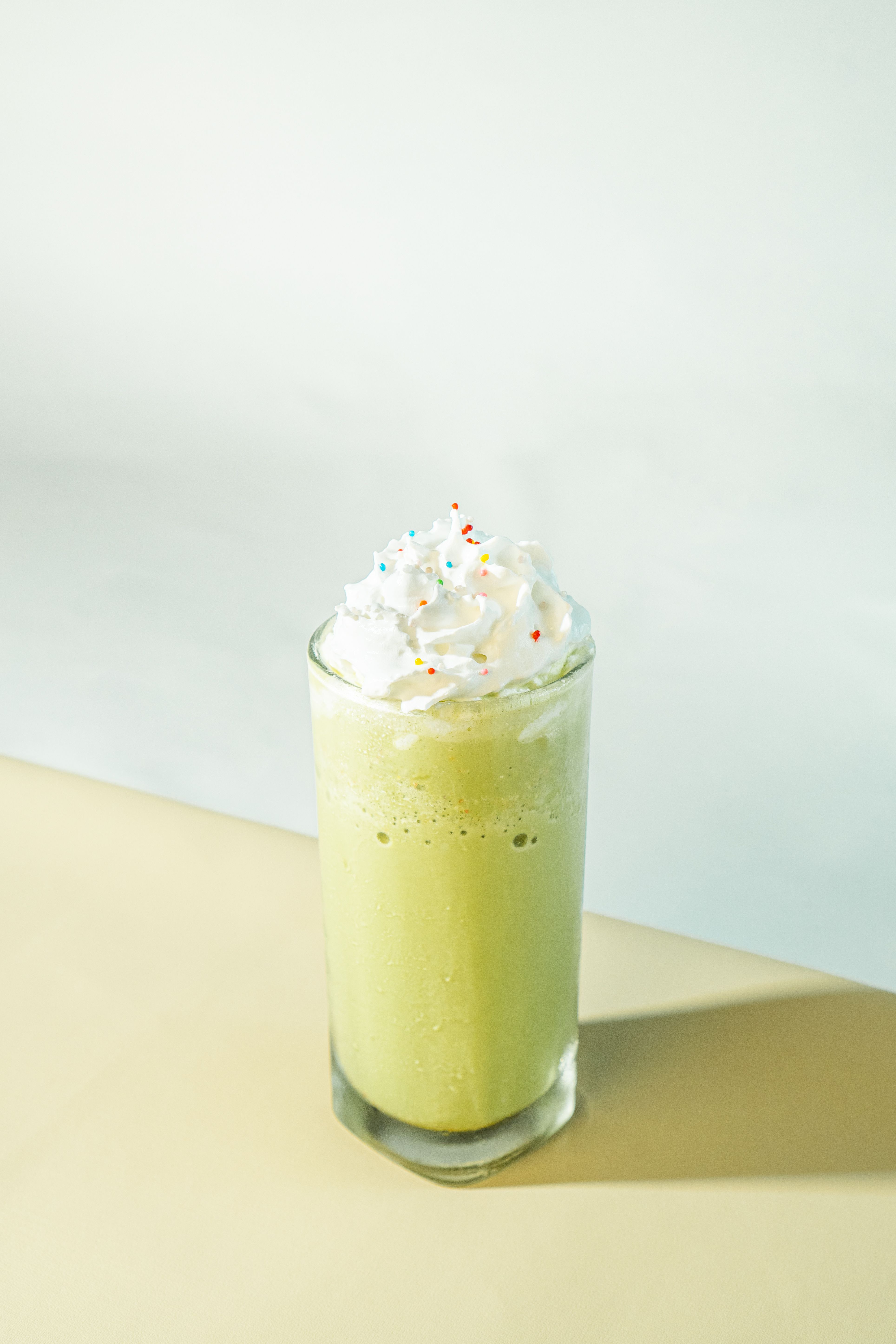 Refreshing Matcha Milkshake with Whipped Cream · Free Stock Photo