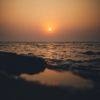 Serene sunset over the Arabian Sea, captured from Mumbai's coastline. Perfect for travel and nature themes.