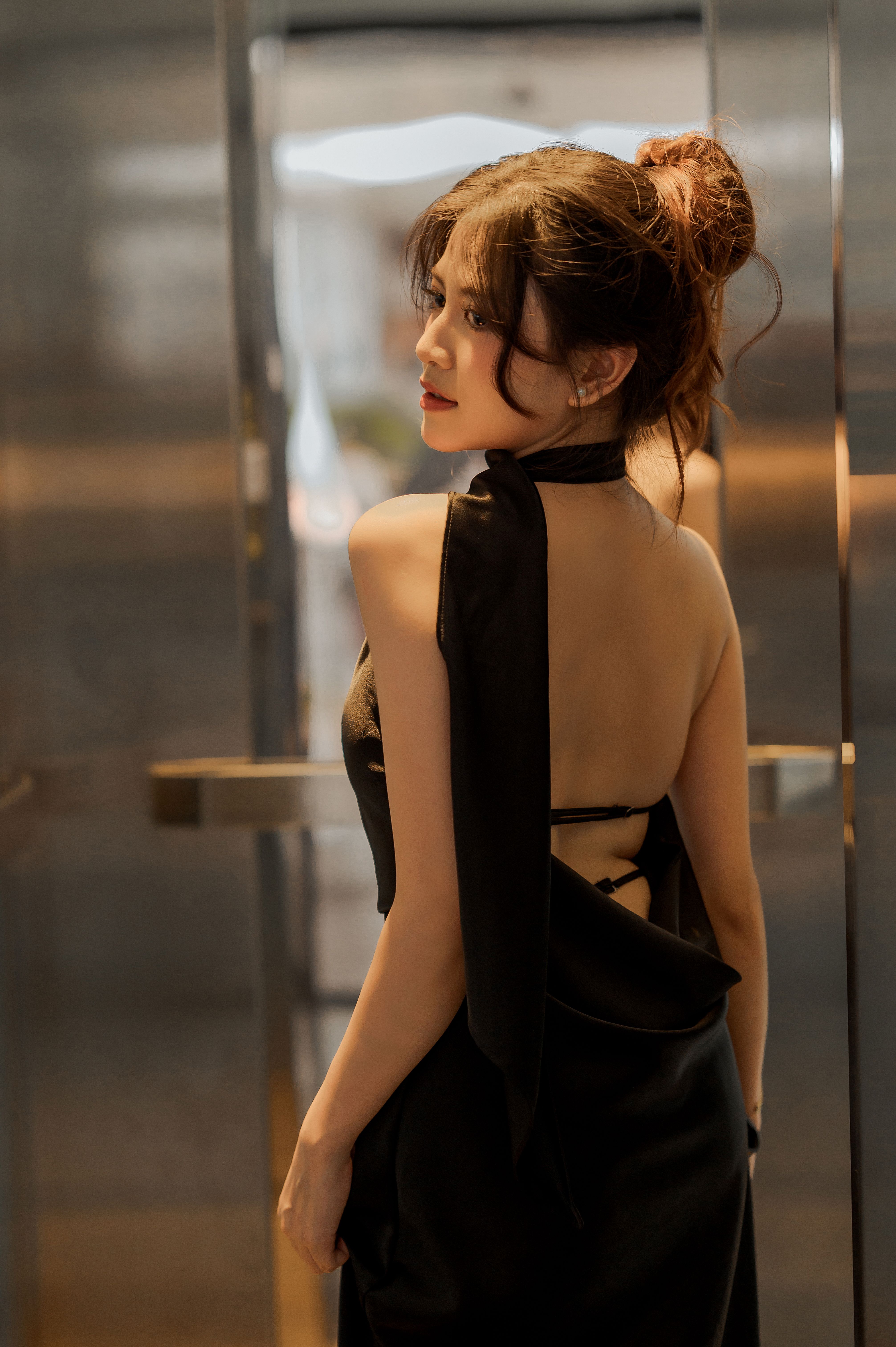 Woman wearing an elegant little black dress