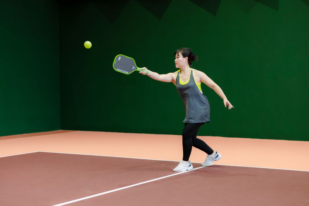 Pickleball player on an indoor court