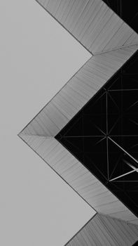 Minimalist black and white photo of abstract geometric architecture with a modern style.
