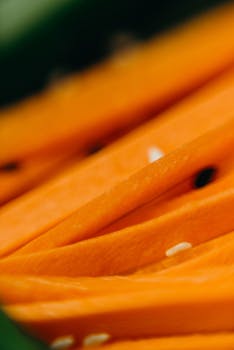 Macro shot of vibrant orange carrot slices highlighting fresh, organic texture