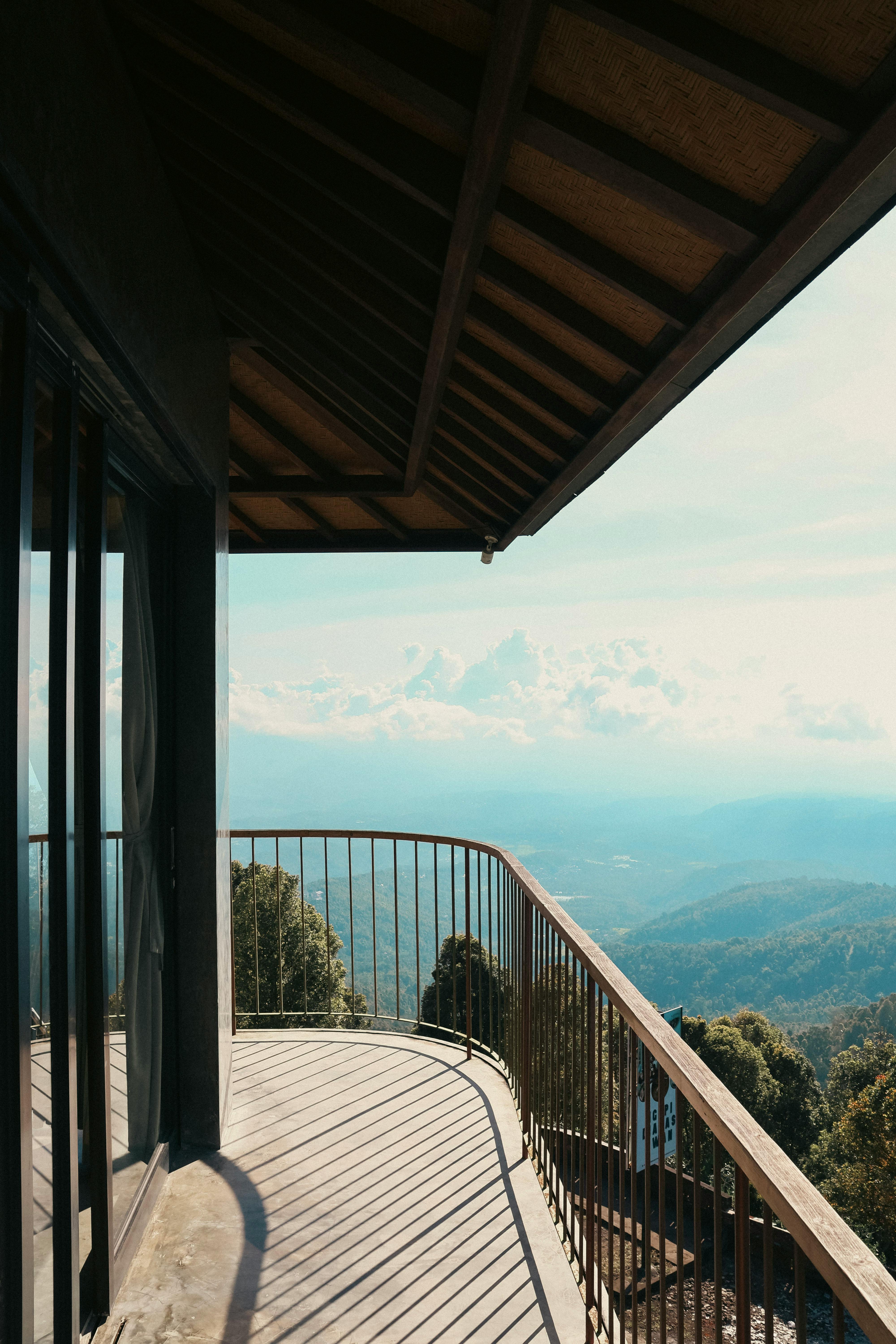 Enjoy a stunning mountain view from a balcony in Bali, capturing nature's beauty.