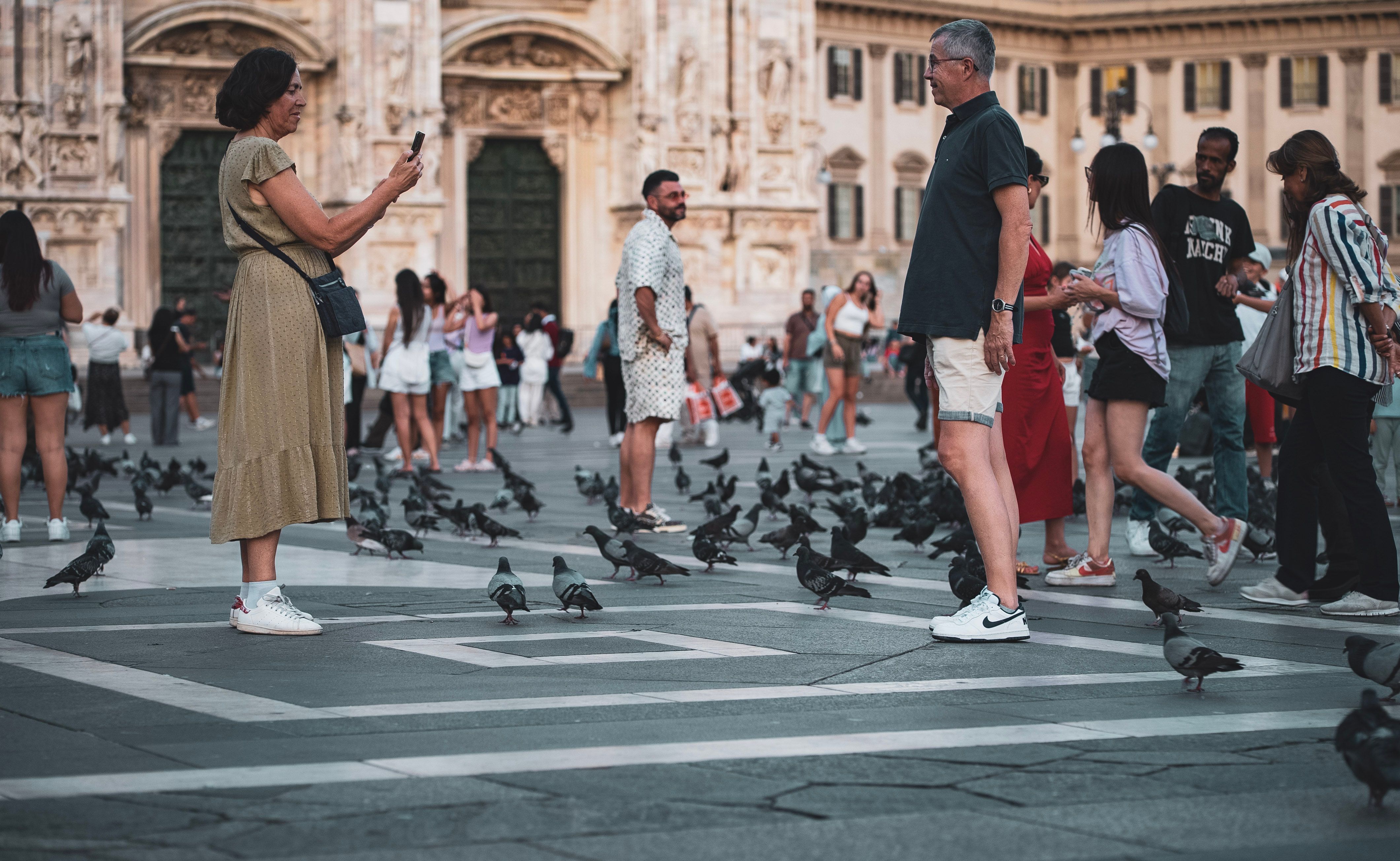 Tourists enjoying Piazza del Duomo in Milan