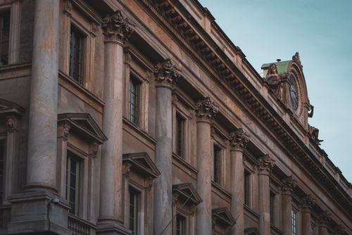 Free Close-up shot of neoclassical architecture with columns in Milan, Italy. Stock Photo