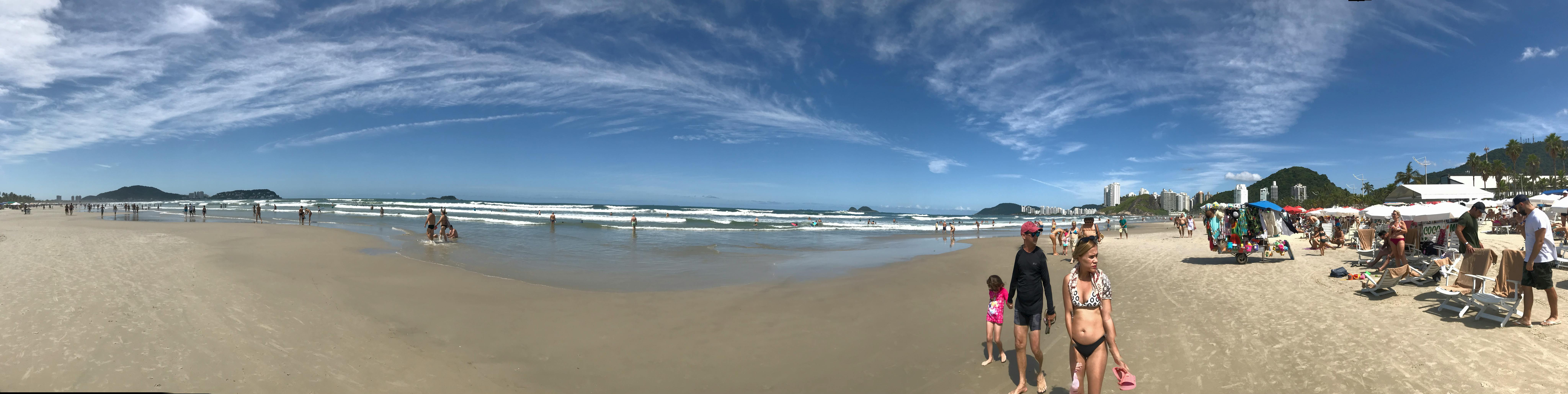 Family-style meal with plant-based dishes and a small platter of grilled fish