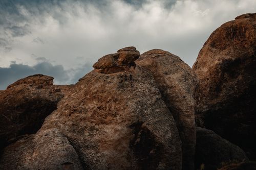 Free Stunning rocky landscape under moody skies in Utah, perfect for nature and travel themes. Stock Photo