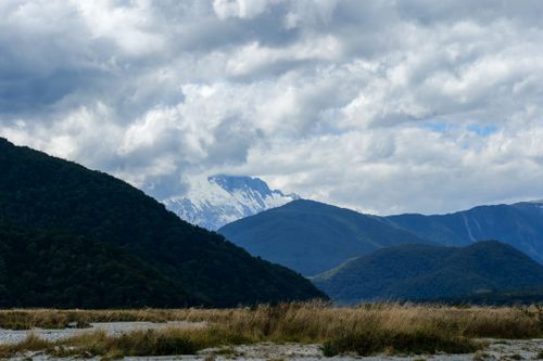 Free Breathtaking view of New Zealand's mountains and cloudy skies, perfect for nature enthusiasts. Stock Photo