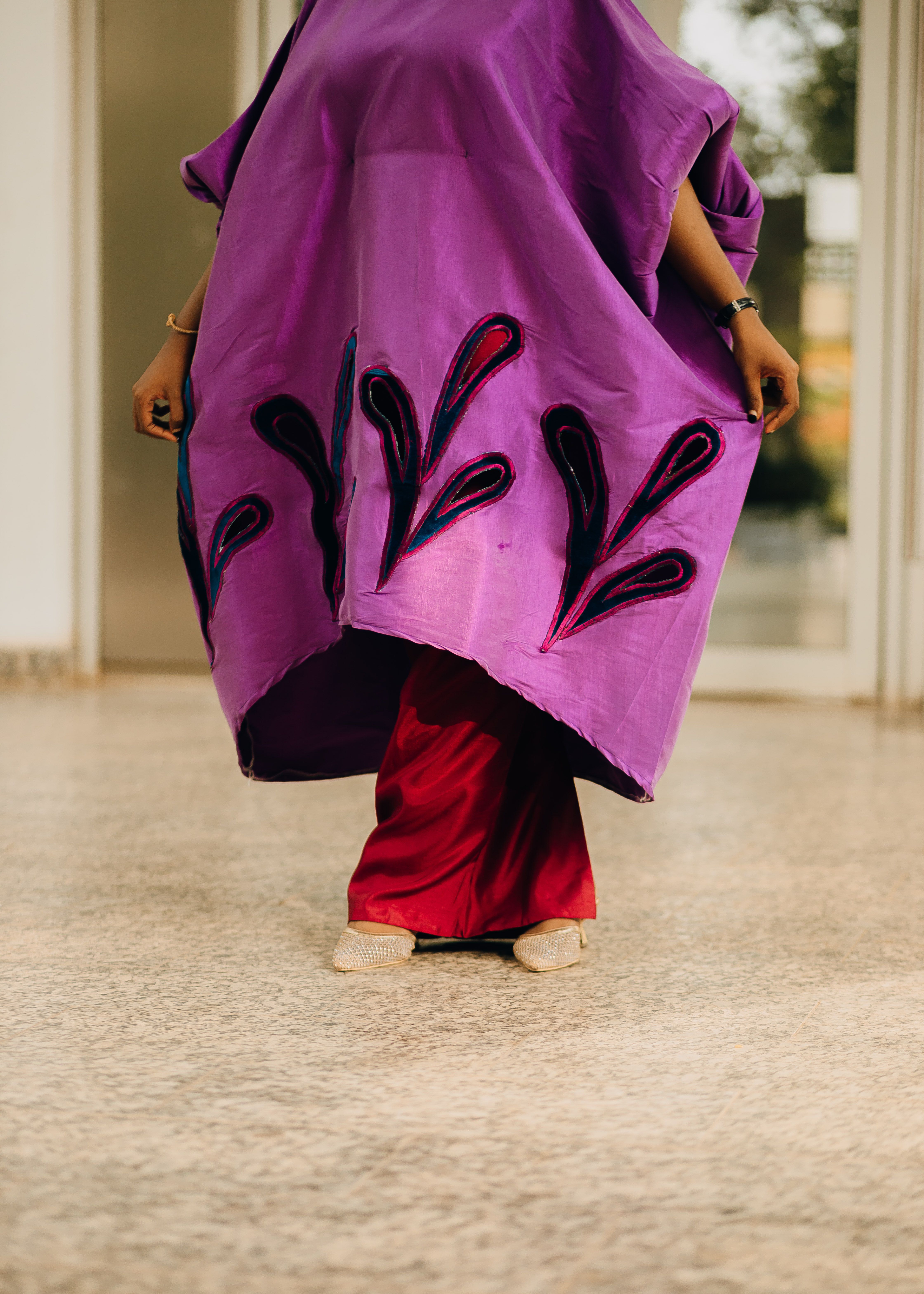 Elegant Woman in Vibrant Traditional Attire Indoors · Free Stock Photo