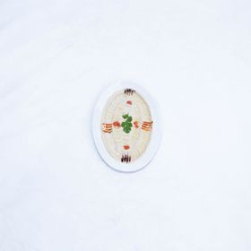 Za'atar hummus plated on a light surface, photo by J KREATOR on Pexels