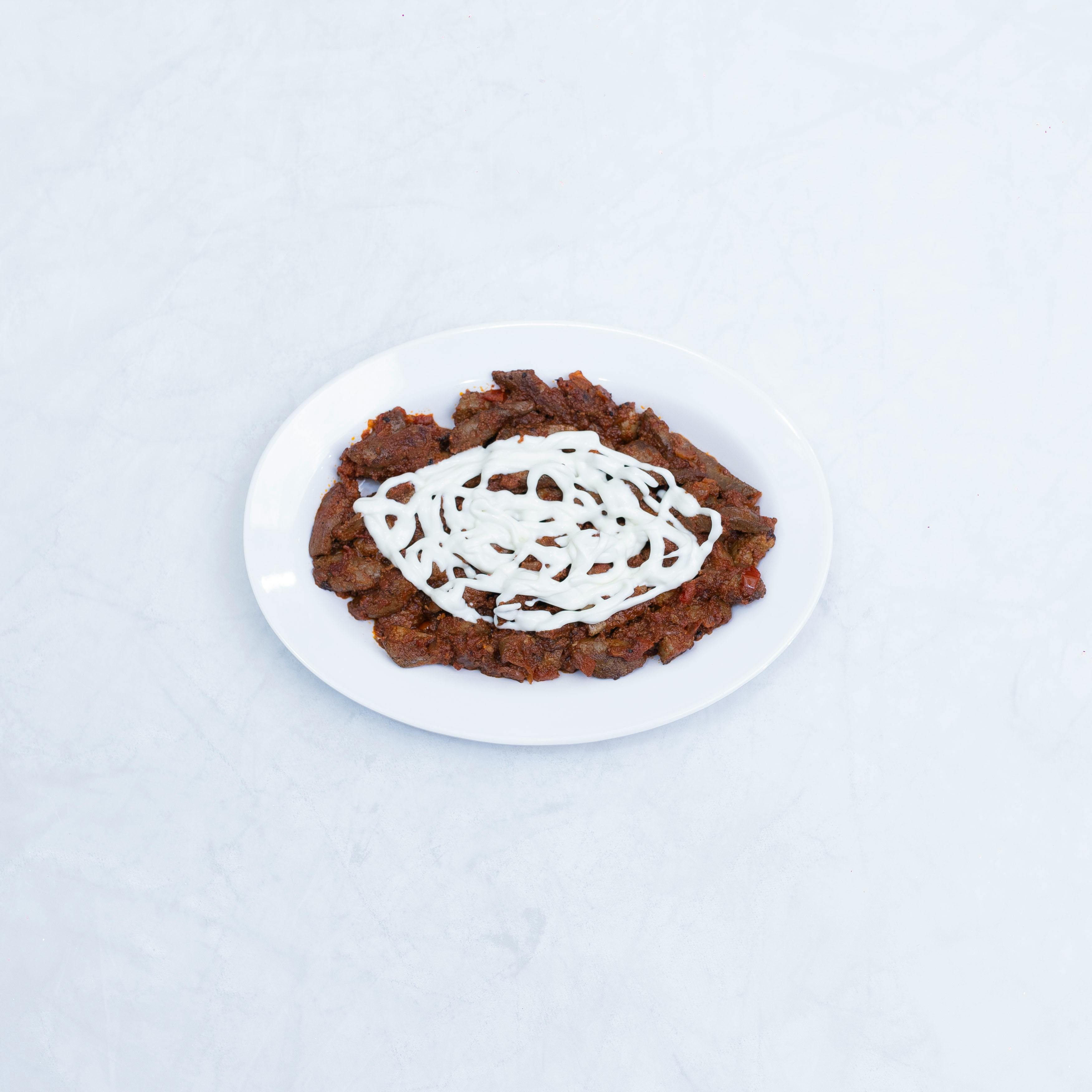 Delicious Iskender Kebab on White Plate