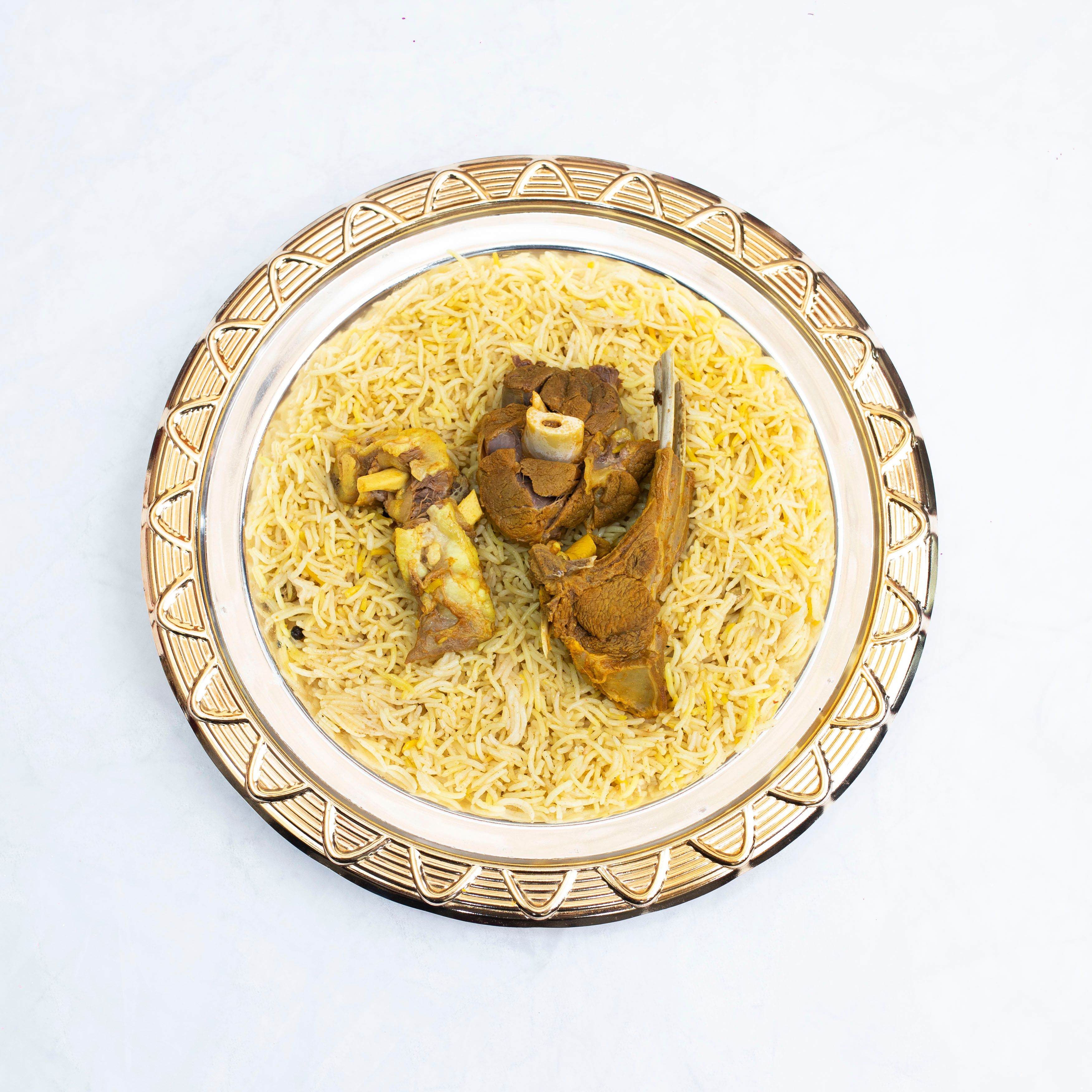 Aromatic Lucknowi biryani with light colors and whole spices - J KREATOR on Pexels