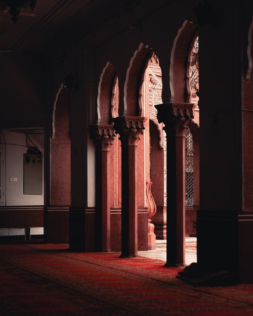 Free Capture of ornate arches inside a mosque in Peshawar, showcasing Islamic architectural beauty. Stock Photo