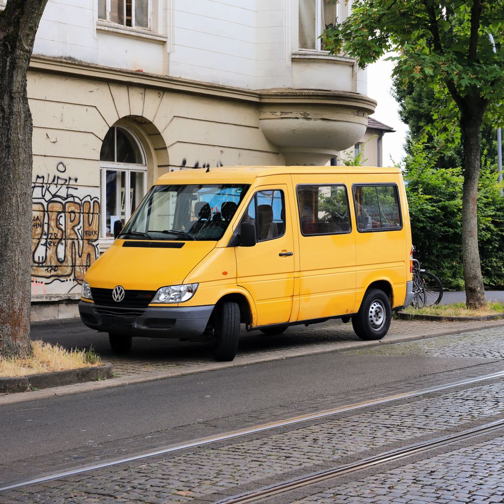 Stepney — man and van team loading a removal van