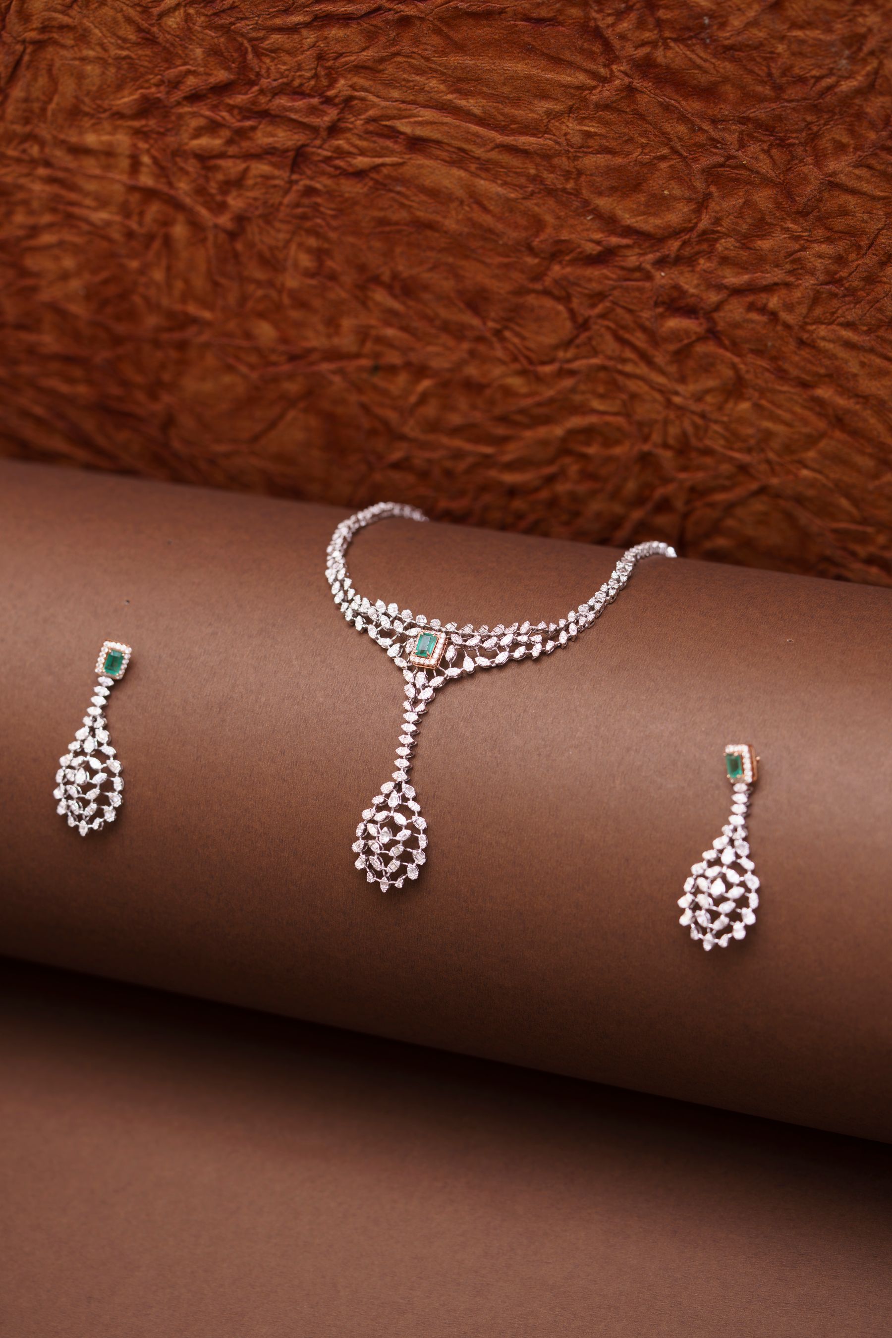 An emerald and diamond parure