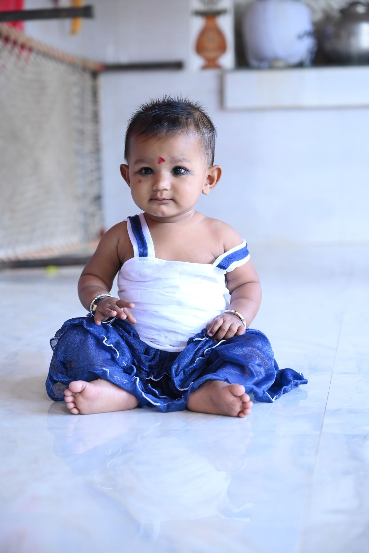 Baby in a traditional Indian outfit