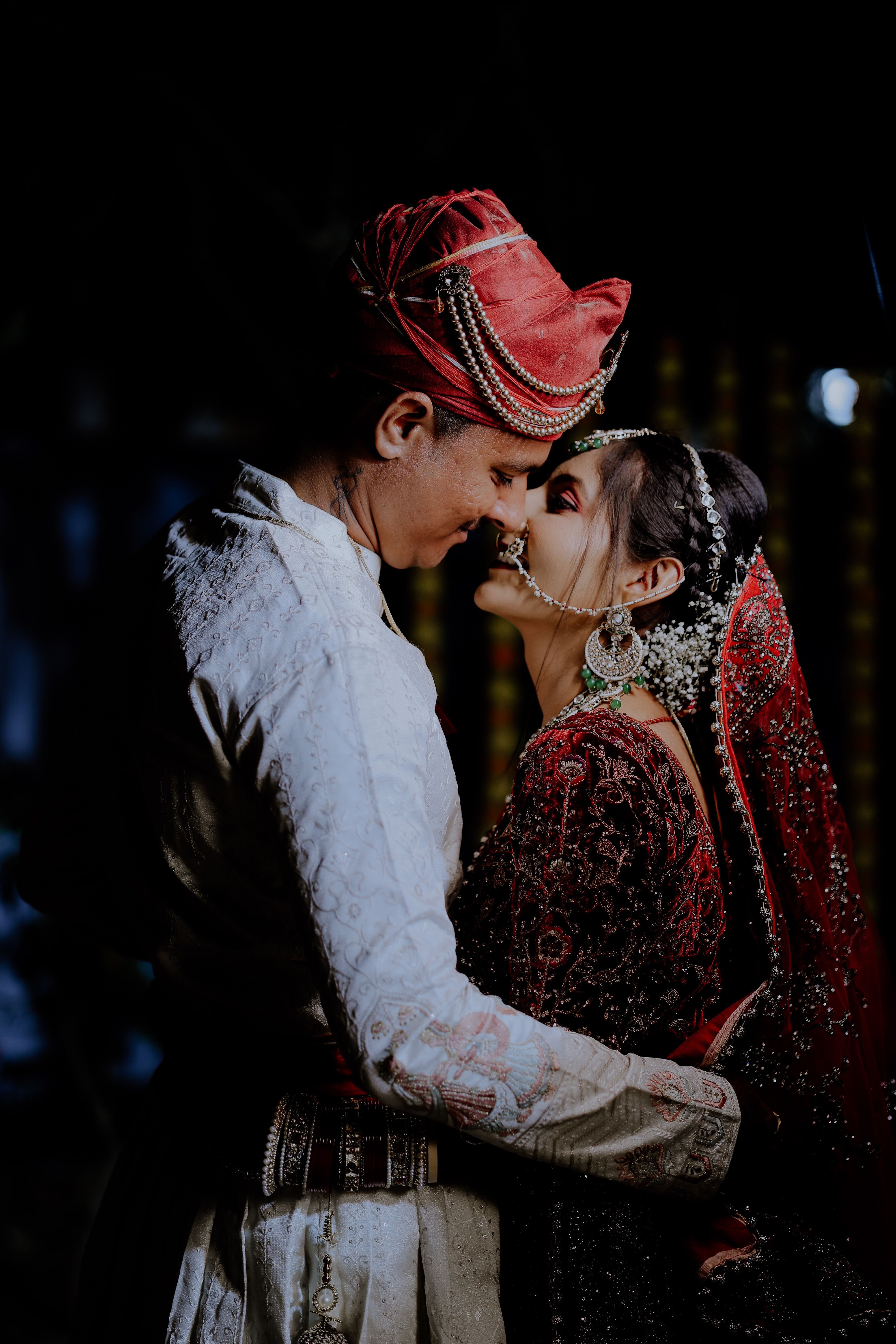 Romantic Indian Wedding Couple Embrace at Night · Free Stock Photo