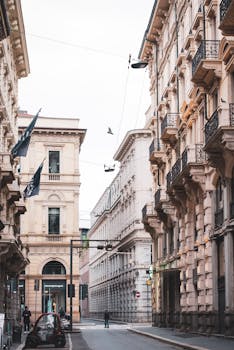 Detailed perspective of classic Italian architecture in Milan's city center.