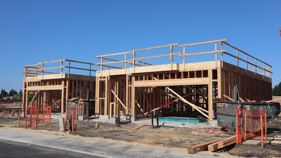New residential construction with wooden framing in Elk Grove, California.