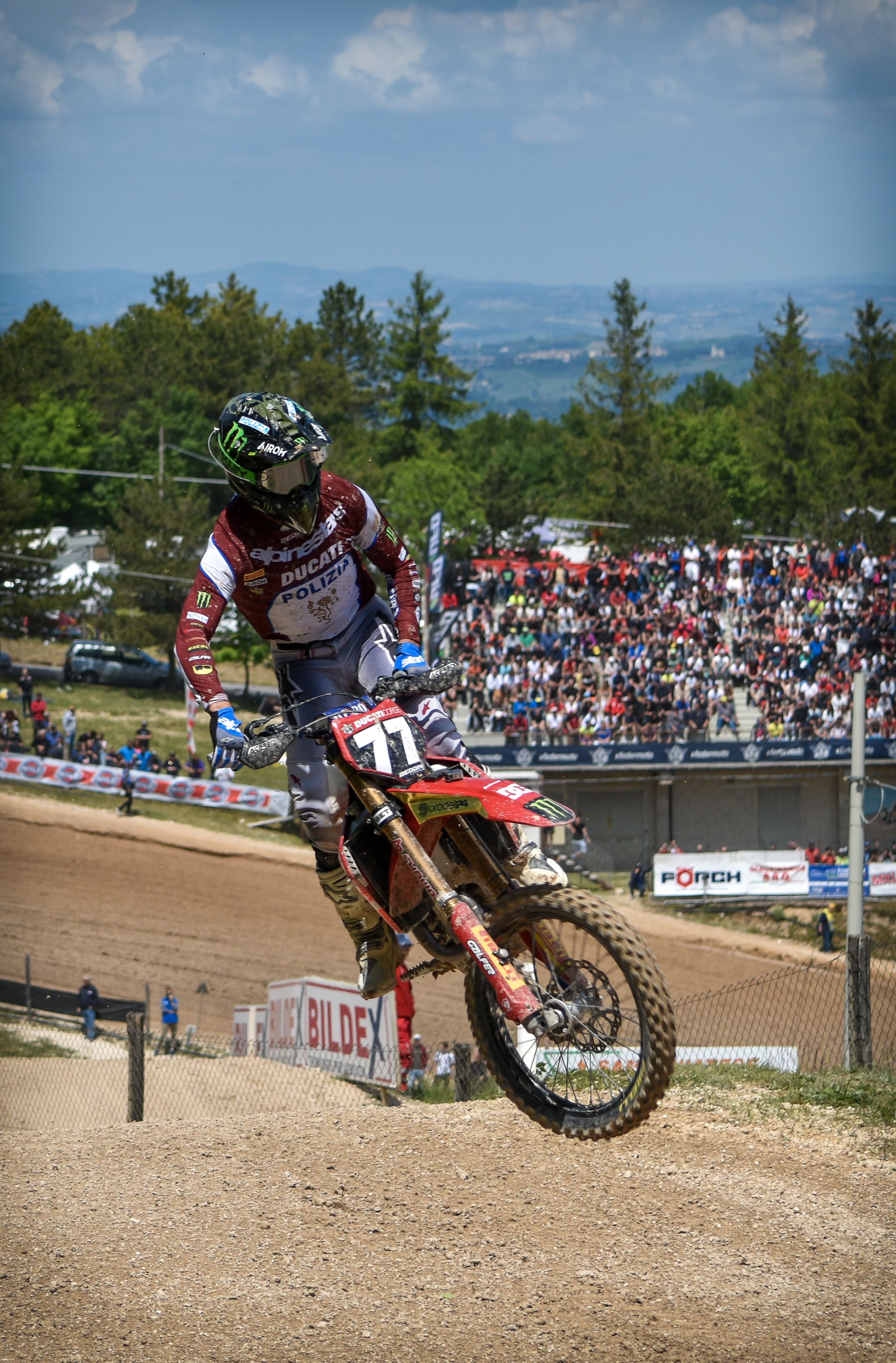Dirt Bike Racing Action at Outdoor Track · Free Stock Photo