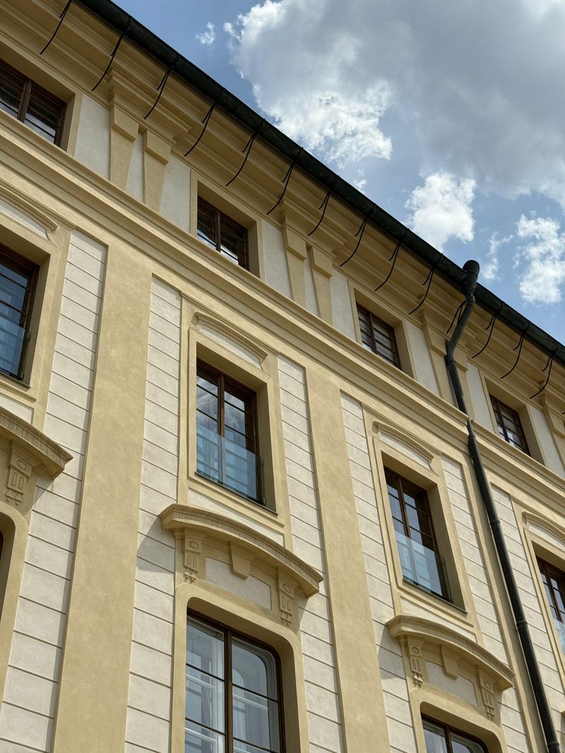 Classical building facade under a bright sky