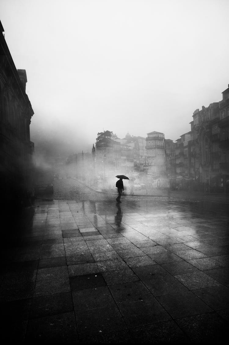 Black And White Photo Of Man With Umbrella