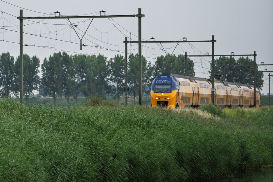 Modern NS Intercity train arriving at a station in the Netherlands
