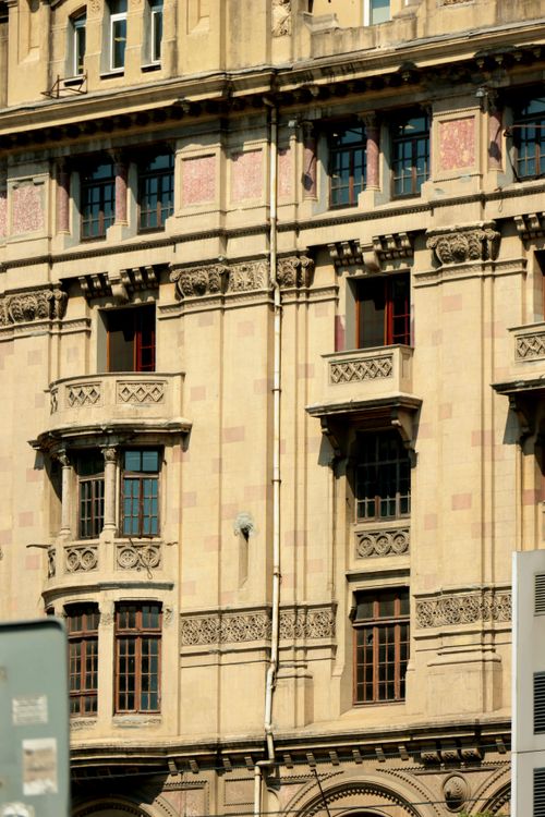 Historic Building Facade with Ornate Details · Free Stock Photo