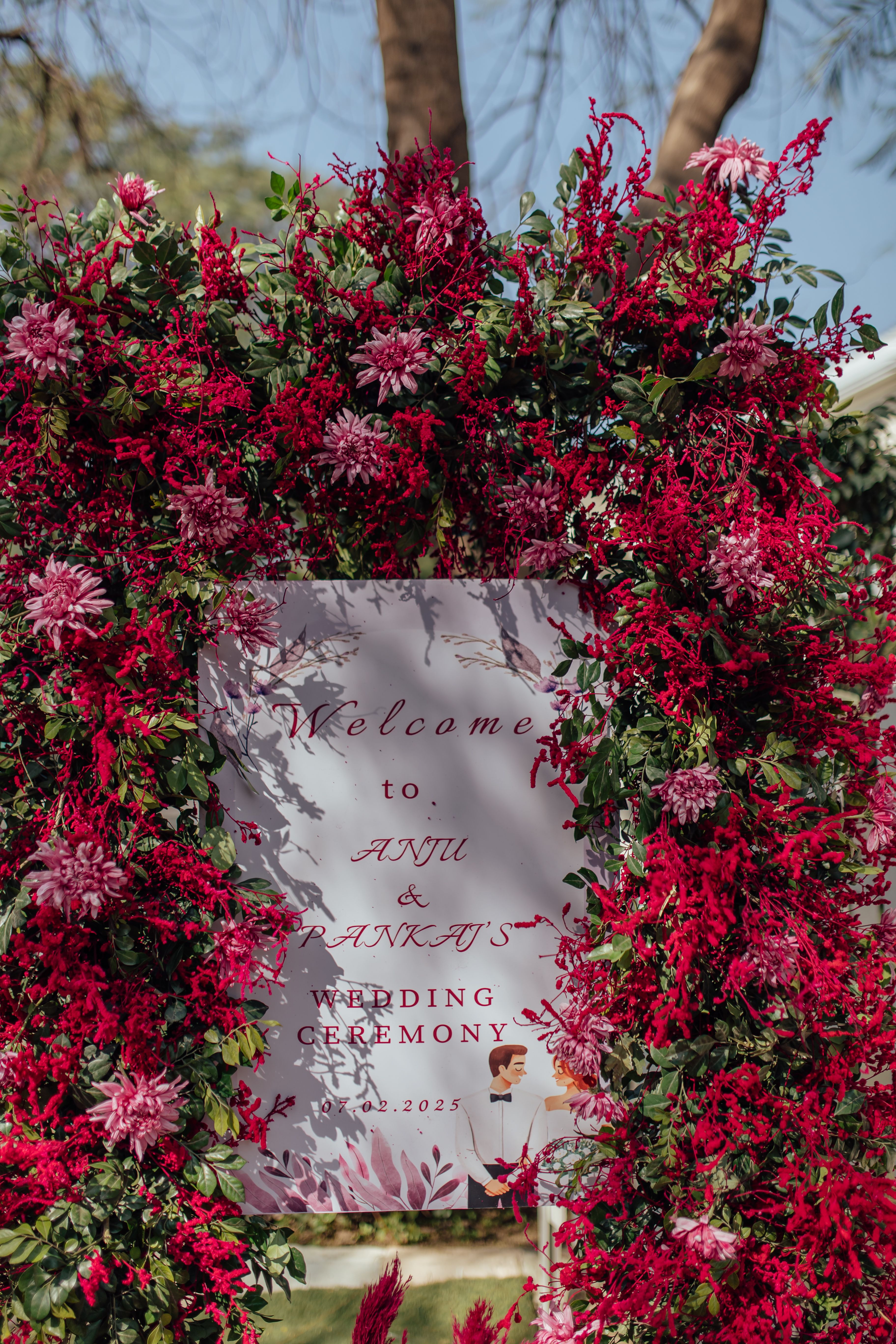 Floral Wedding Welcome Sign with Red Accents · Free Stock Photo