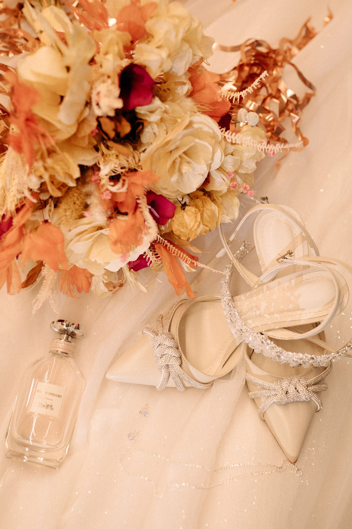 Elegant bridal accessories with a floral bouquet