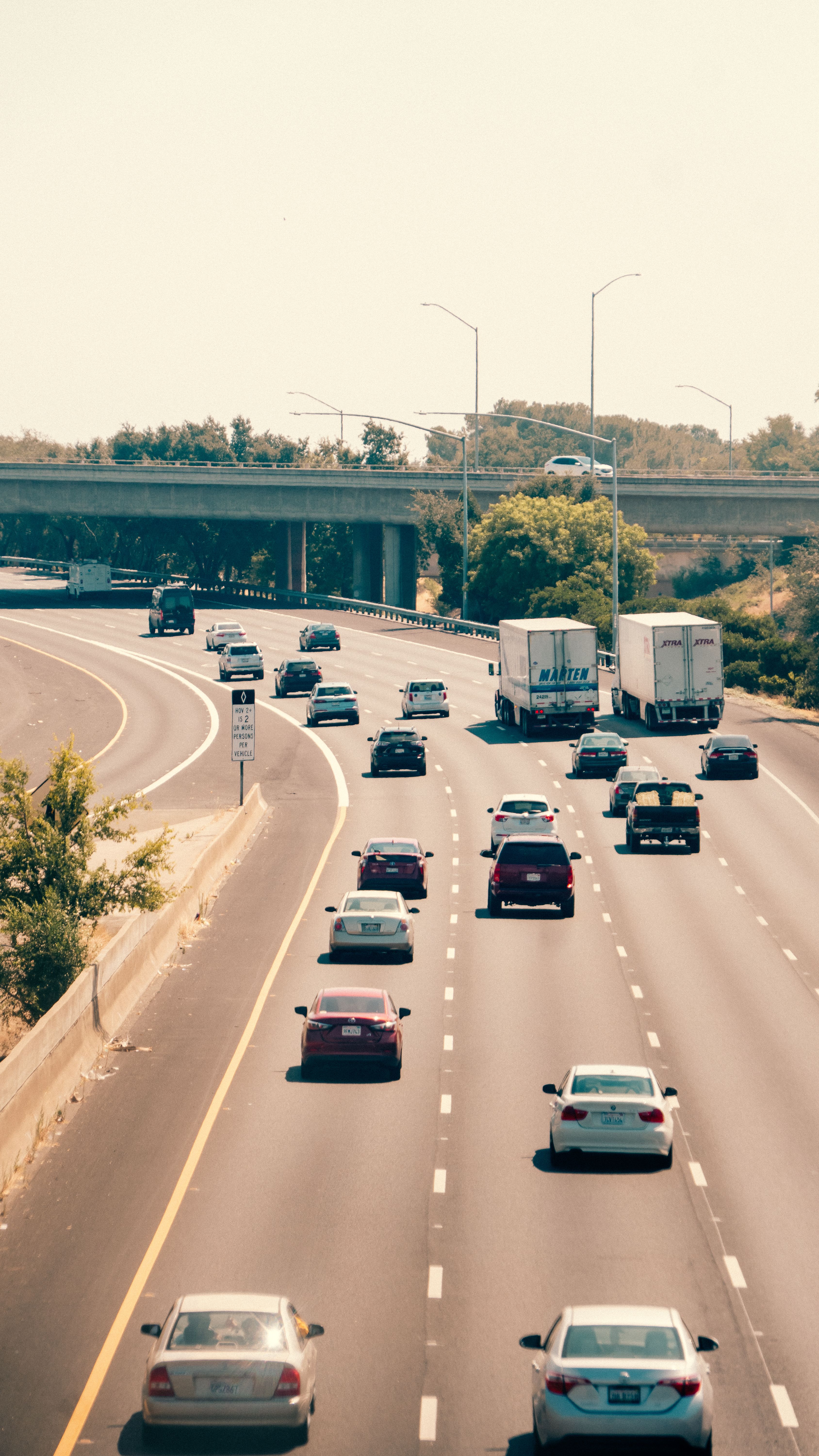Busy Highway Scene with Cars and Trucks · Free Stock Photo