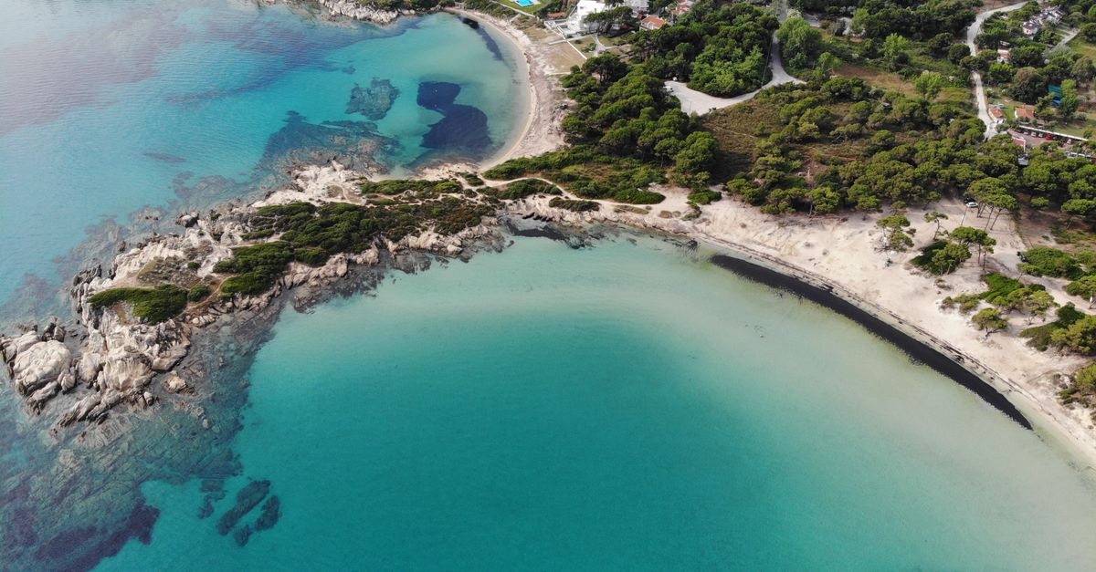 Granite boulders forming sheltered sea pools at Kolymbithres, Paros