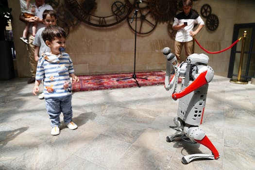 A young boy engages with a humanoid robot during an indoor tech exhibition, symbolizing future innovation.