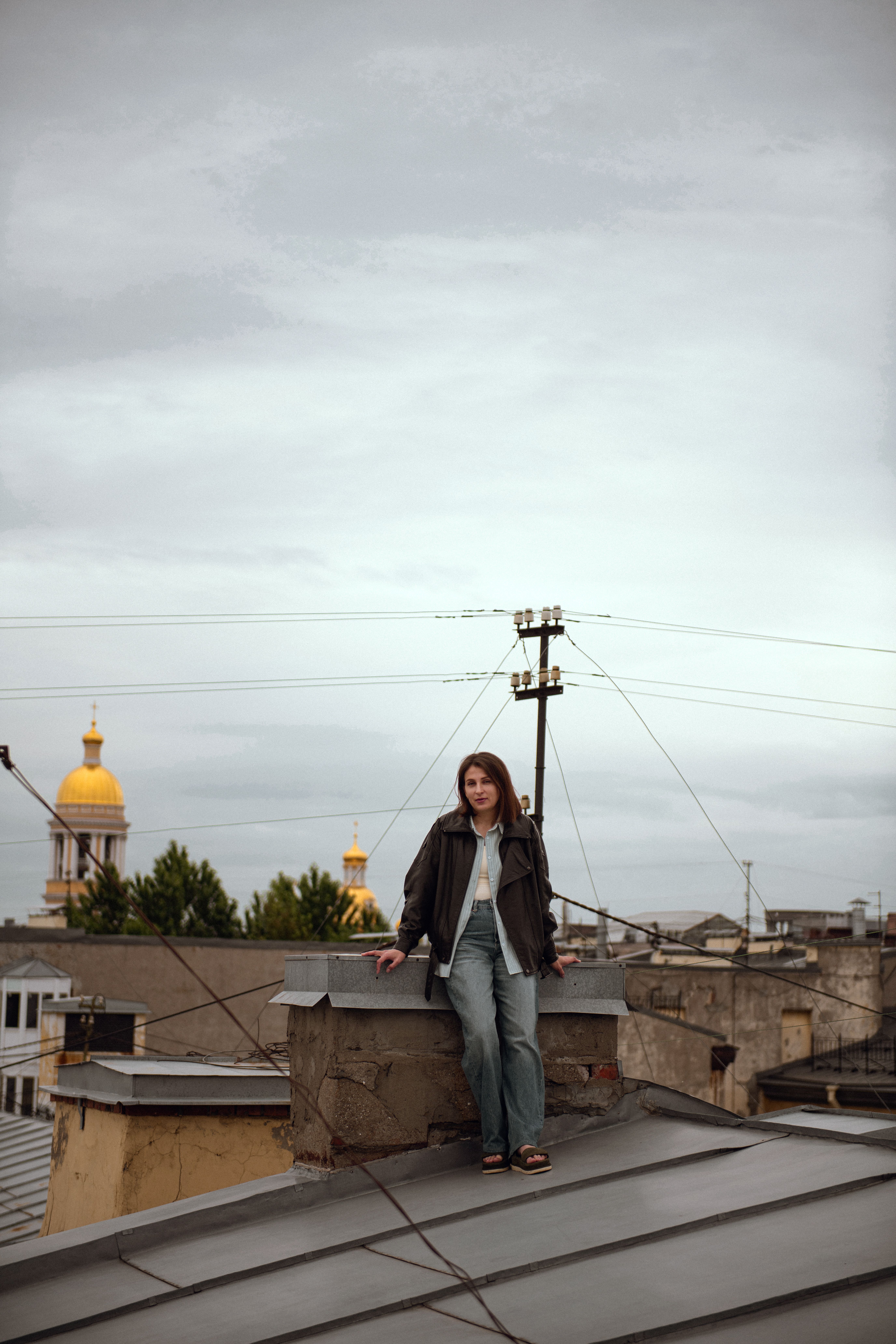 Man Smoking Cigarette on Roof · Free Stock Photo