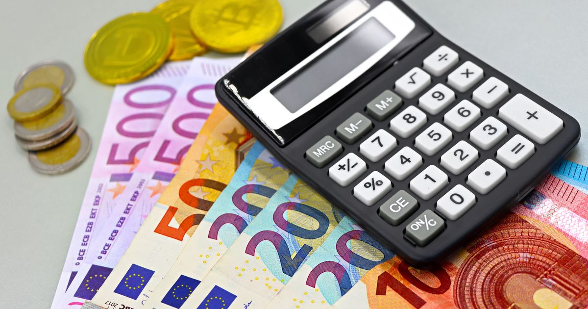 Image of euro banknotes, coins, and a calculator for financial planning. Perfect for finance themes.