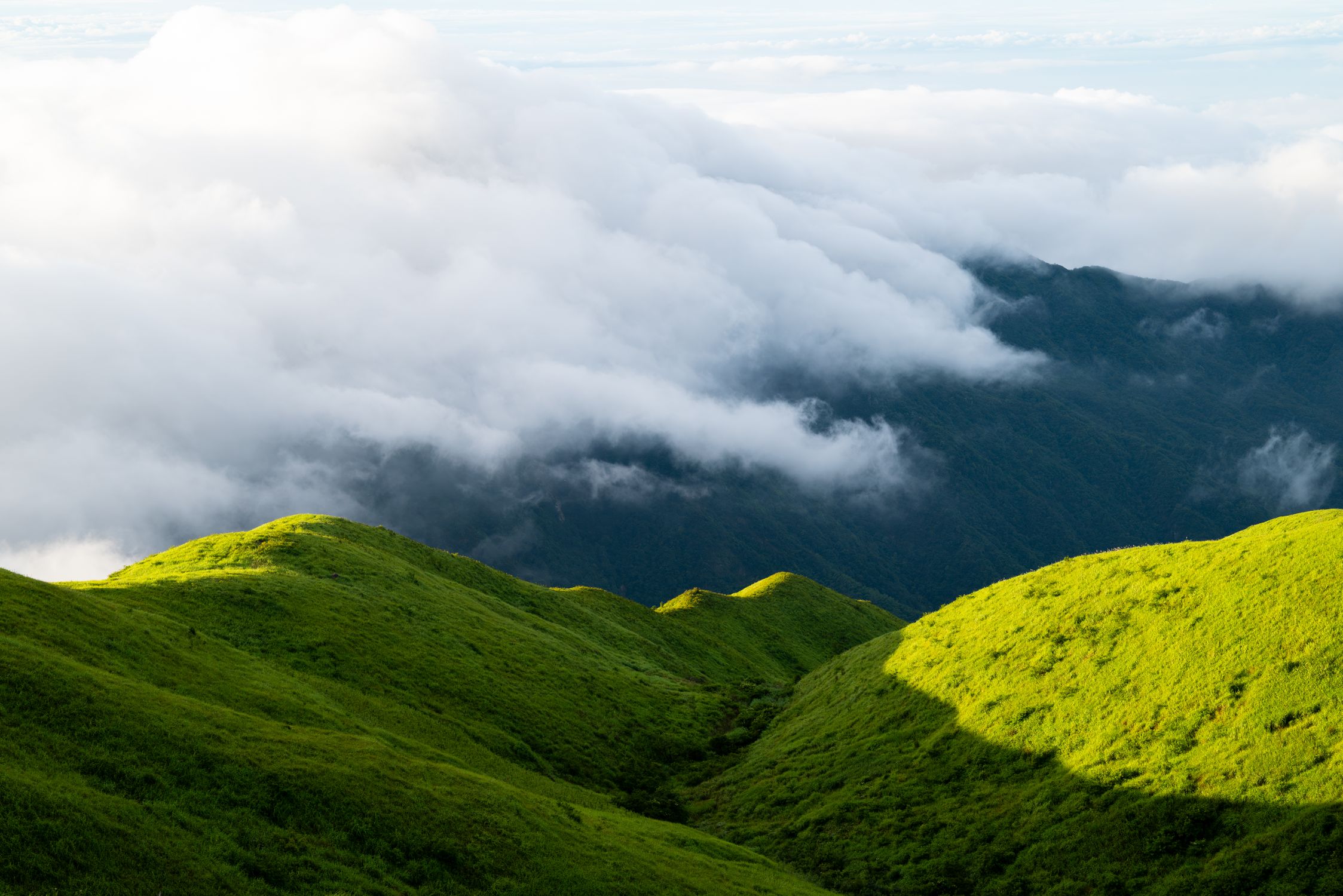 Lush Green Mountain Landscape with Clouds · Free Stock Photo