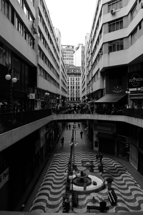 Free Monochrome view of a bustling European-style pedestrian street. Stock Photo
