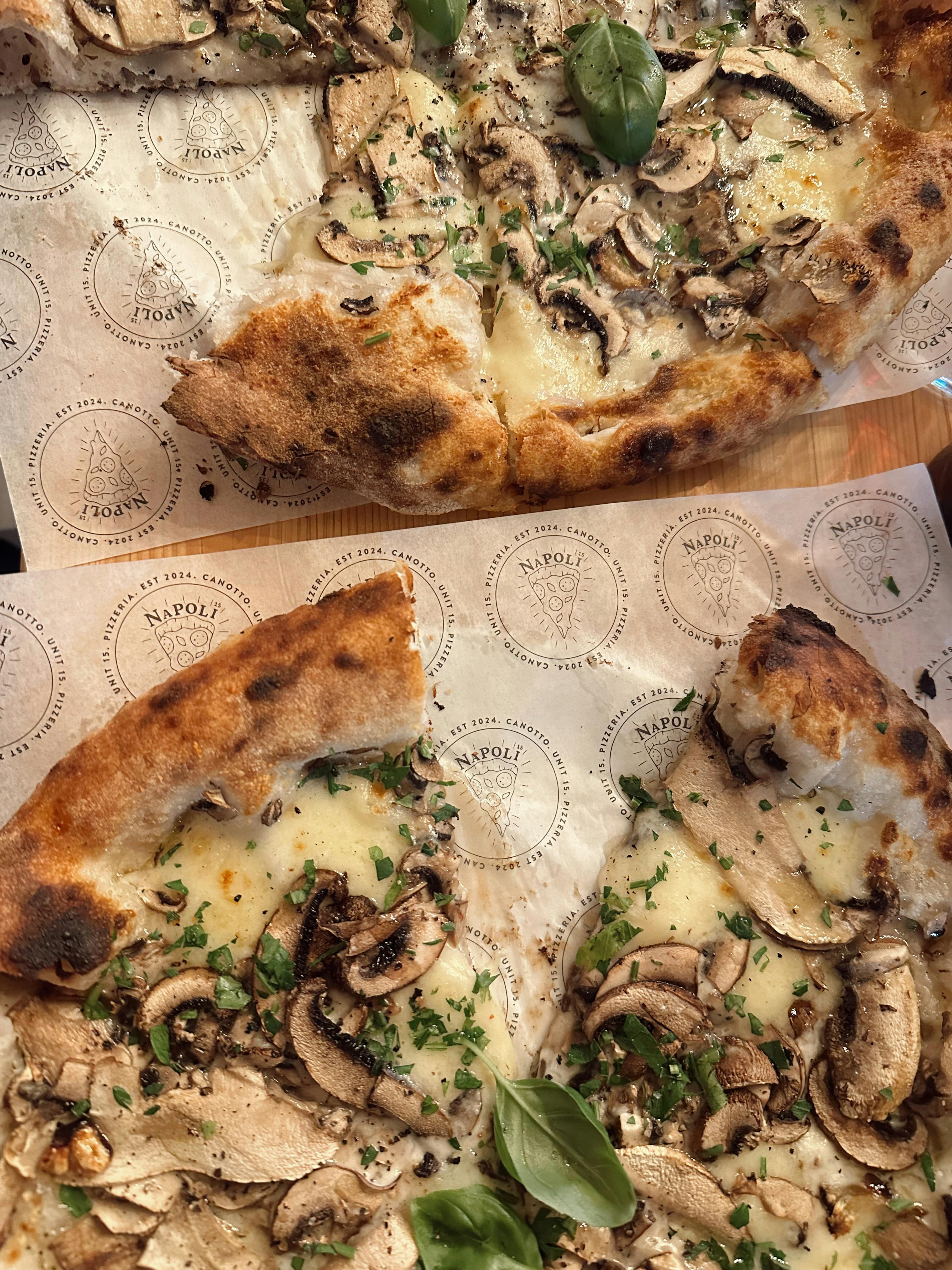 Savor a slice of authentic Italian mushroom pizza in Naples, capturing true culinary artistry.