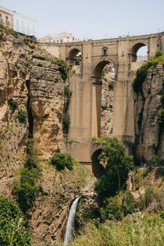 Explore the majestic Puente Nuevo bridge spanning the El Tajo Gorge in Ronda, a highlight of Andalusian architecture.