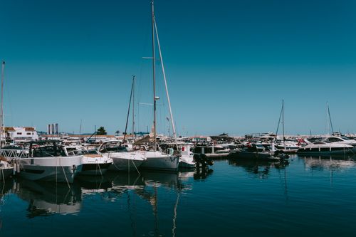 Free Explore the luxurious yachts and boats at Puerto Banus Marina, Marbella, on a sunny day. Stock Photo