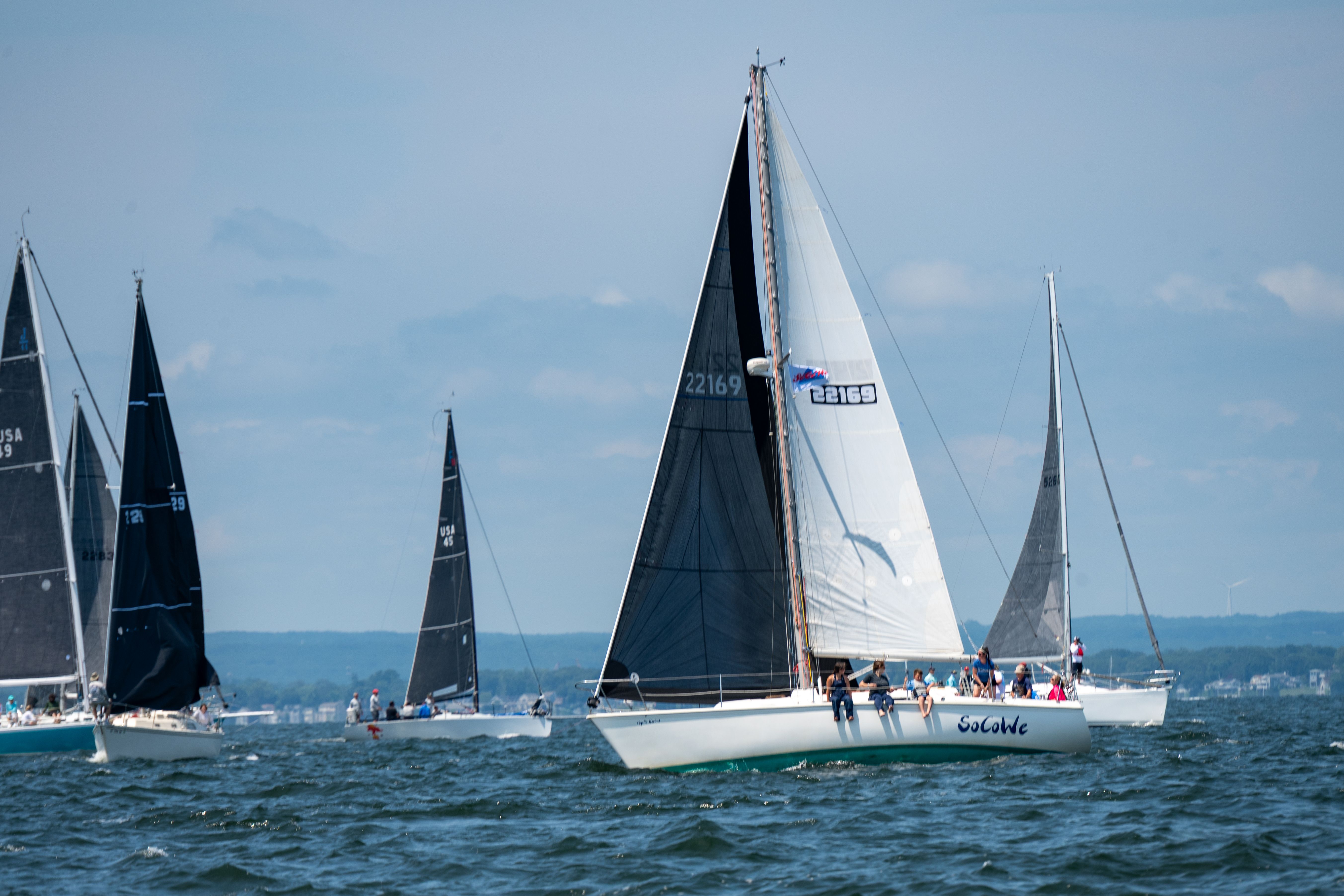 Stunning New York Harbor Brunch Cruise Review: A Luxury Weekend Experience on the Water Review 2026 - Sailboats compete in a thrilling regatta on Narragansett Bay in East Greenwich.