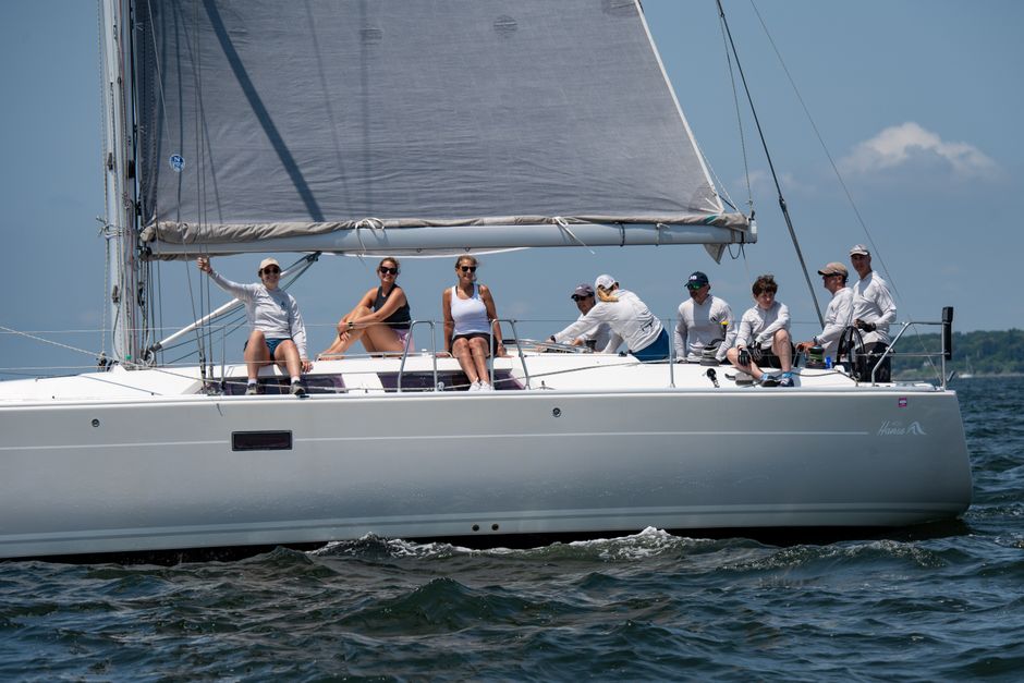 Breathtaking Private Snorkel Trip from Oahu on a Yacht Review: The Ultimate West Oahu Experience Review 2026 - Crew members racing a sailboat in blue waters of Narragansett Bay.