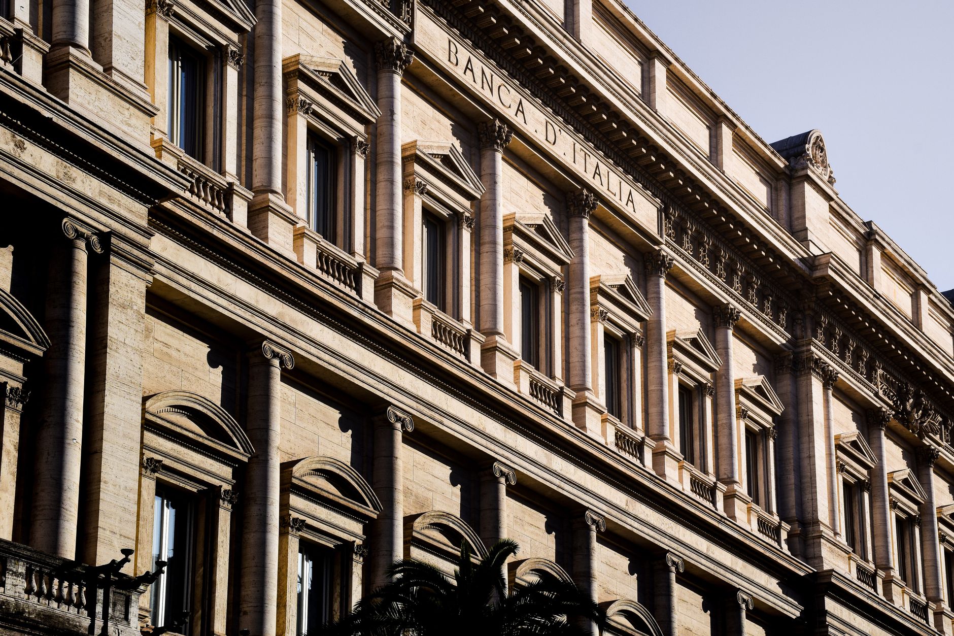 Sunlit facade of the iconic Banca d'Italia in Rome, showcasing classic architecture.