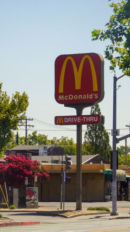 McDonald's Drive-Thru Sign on Sunny Day · Free Stock Photo