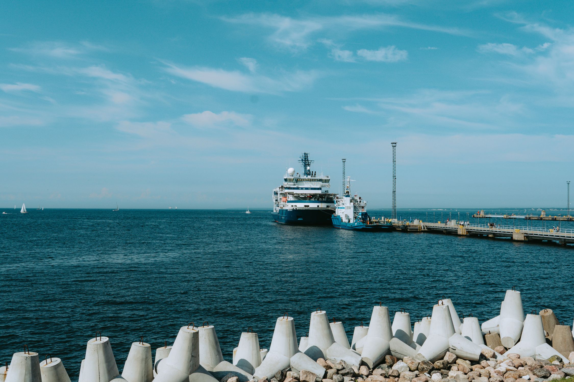 Scenic view of a cruise ship docked at Tallinn Harbor, capturing Estonia's coastal charm.
