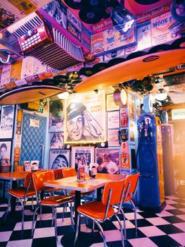 Vibrant retro diner showcasing vintage decor and memorabilia for a nostalgic experience.