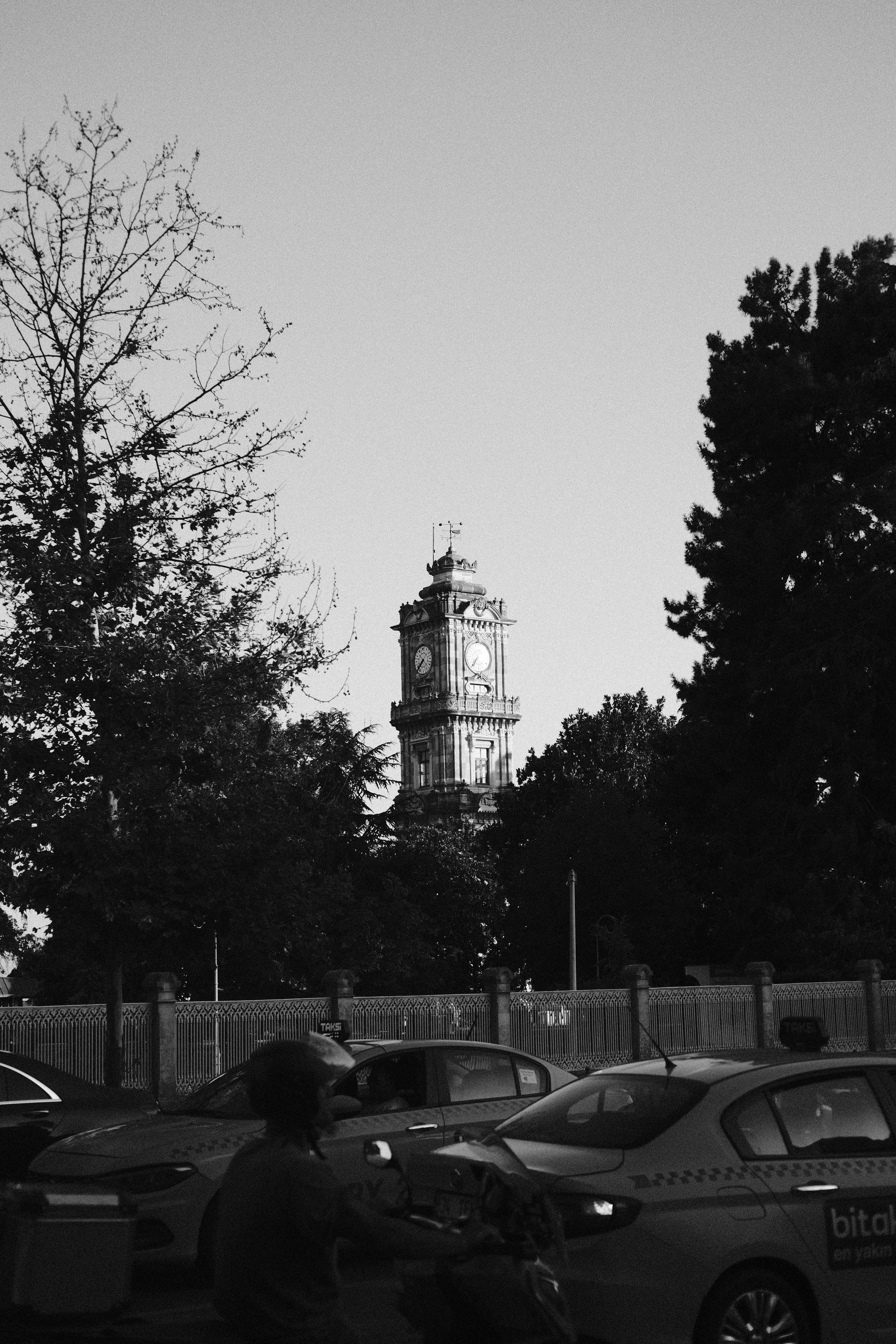 Black and White Urban Clock Tower Scene · Free Stock Photo