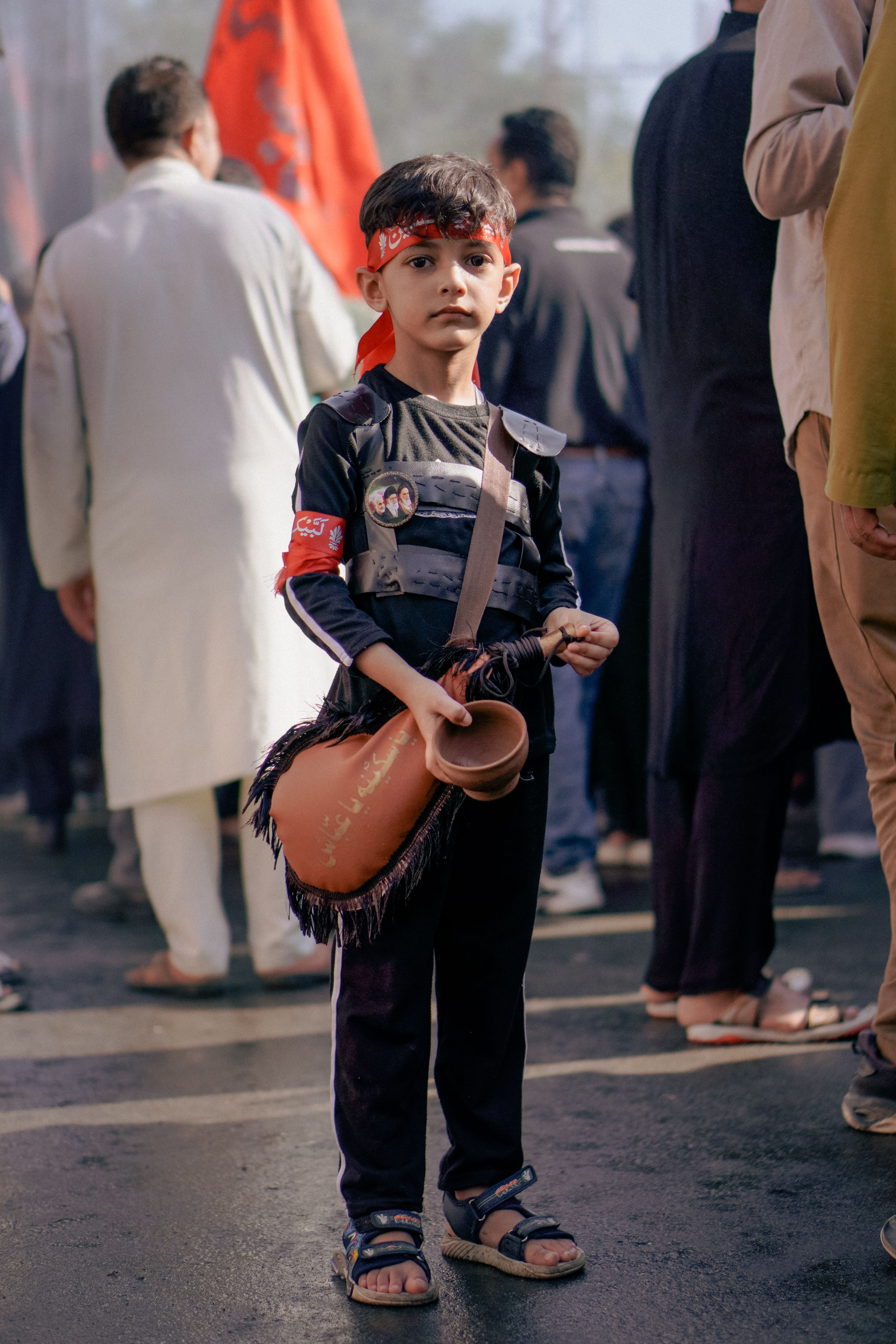 Young Boy in Traditional Costume at Cultural Event · Free Stock Photo