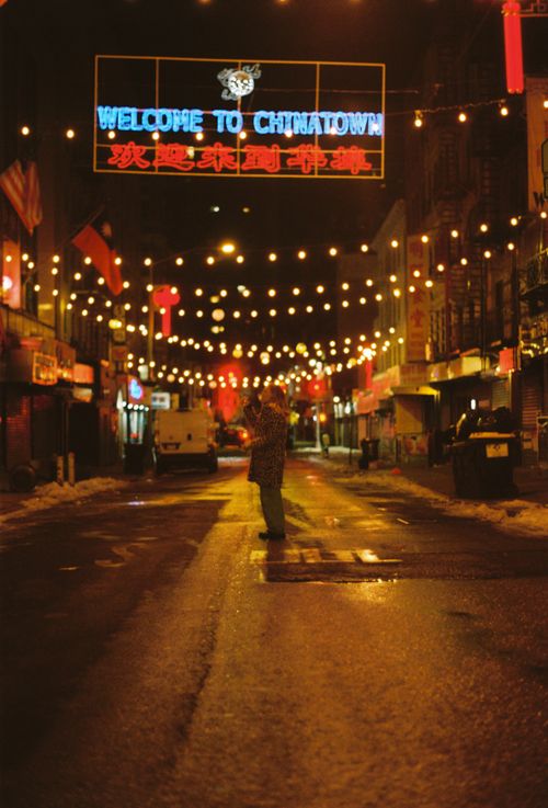 Free Vibrant nighttime scene in Chinatown featuring neon lights and illuminated streets. Stock Photo