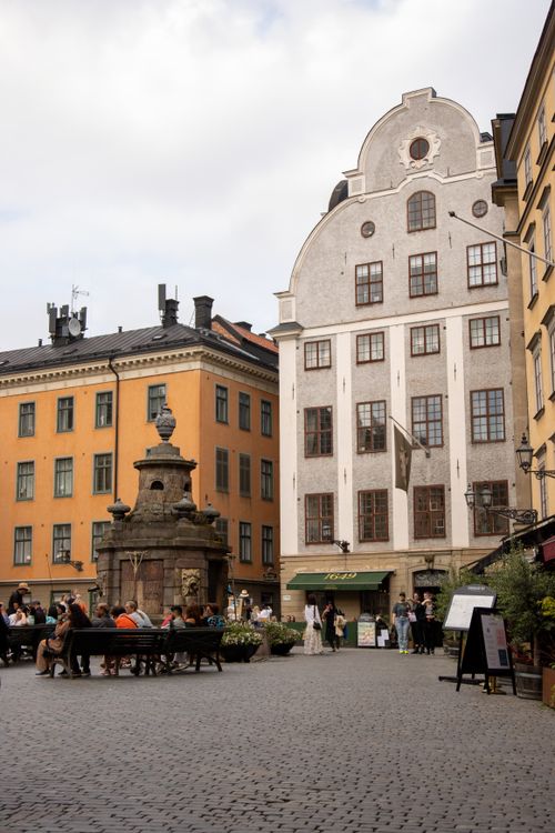 Free Charming view of historic buildings and cobblestone streets in Gamla Stan, Stockholm. Stock Photo